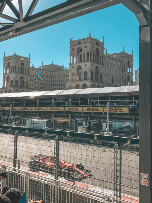Car racing during a Grand Prix holiday in Azerbaijan on a sunny day.