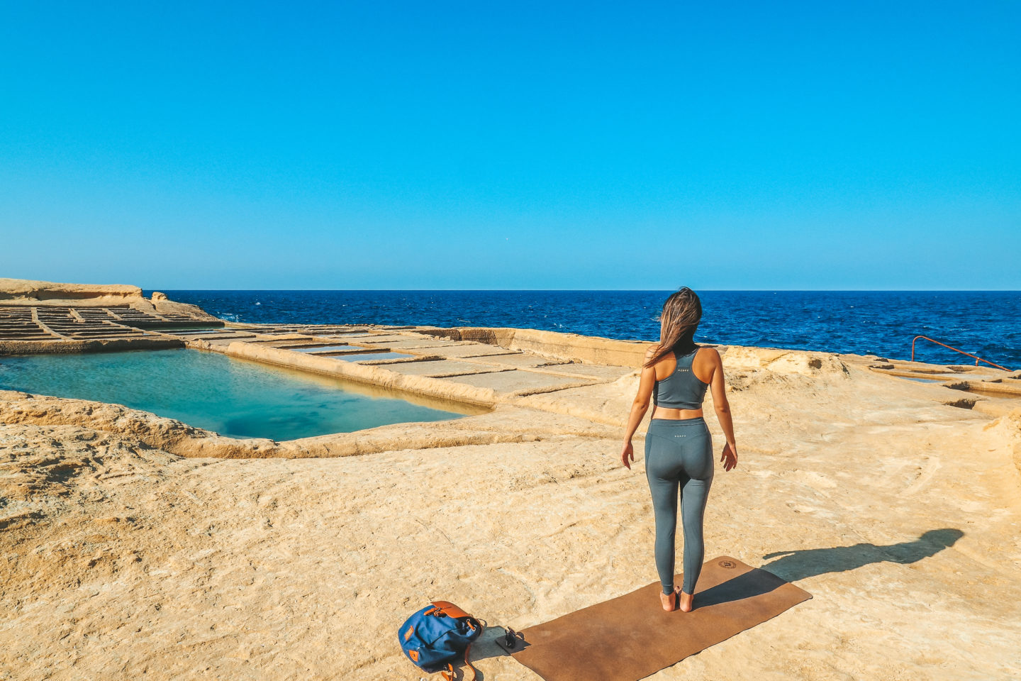 Yoga at the Xwejni Salt Pans in Gozo