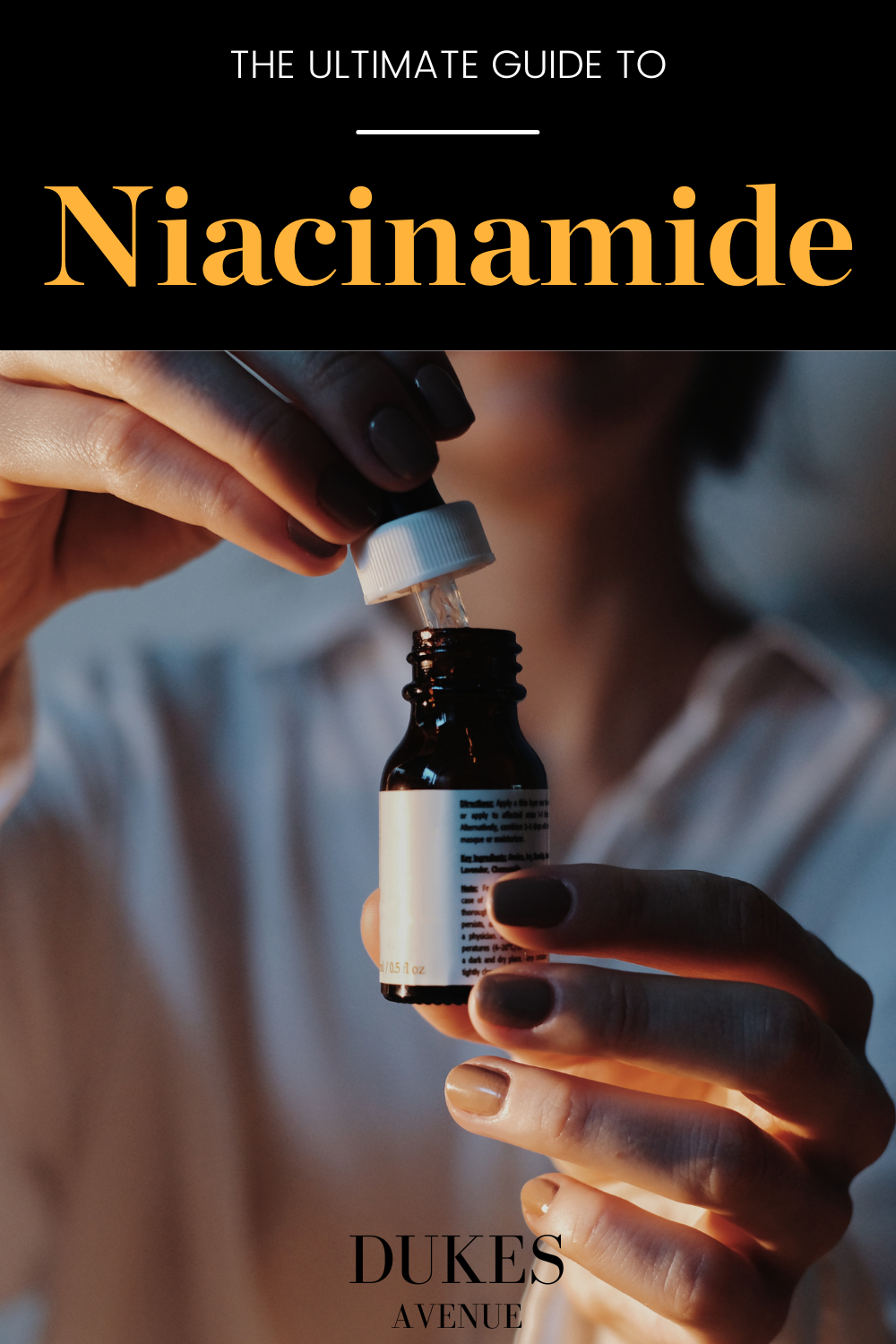 Woman holding bottle and pipette with text overlay 'The Ultimate Guide to Niacinamide'