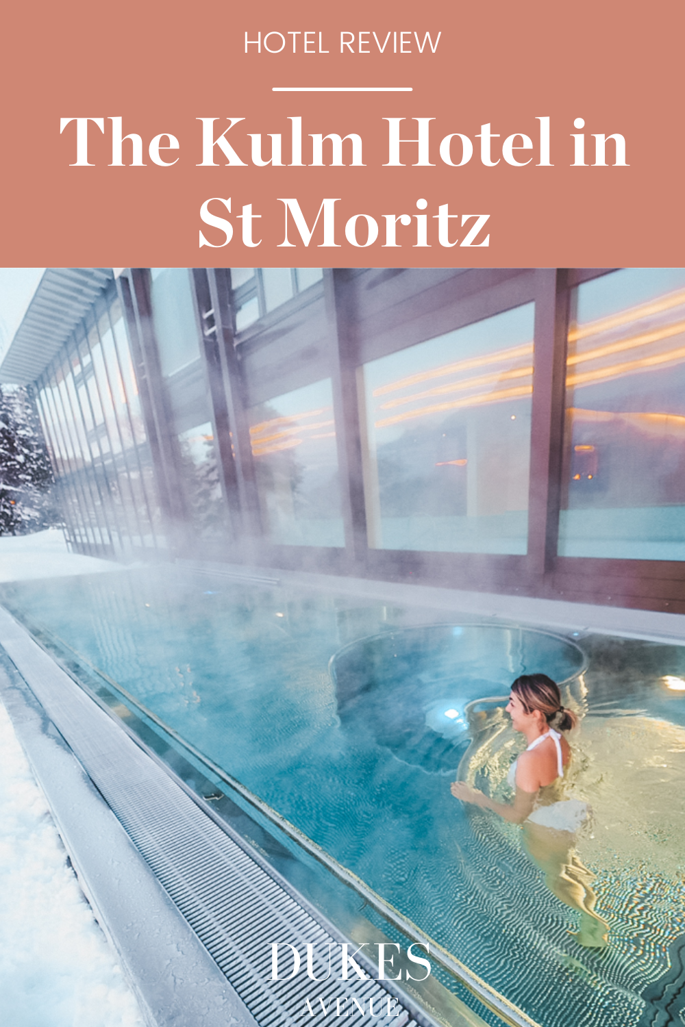 Woman swimming in an outdoor pool with text overlay "Hotel Review - The Kulm Hotel in St Moritz"