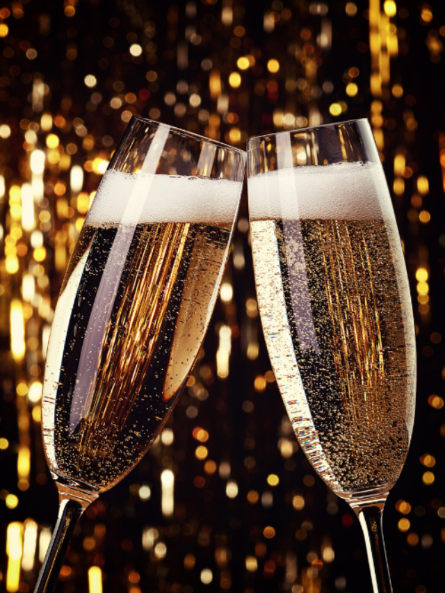 Two champagne glasses against a celebratory background